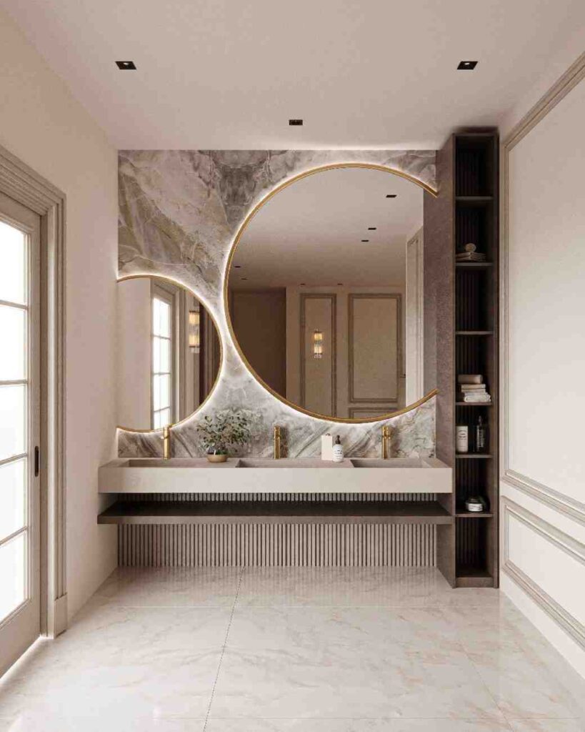 تصميم مدخل فيلا بالرياض — وحدة ديكورية بمرآة دائرية وإضاءة مخفية — بنان للديكور